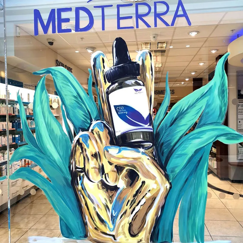 Hand painted window featuring a product feature